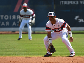 Two male baseball players on the baseball diamond